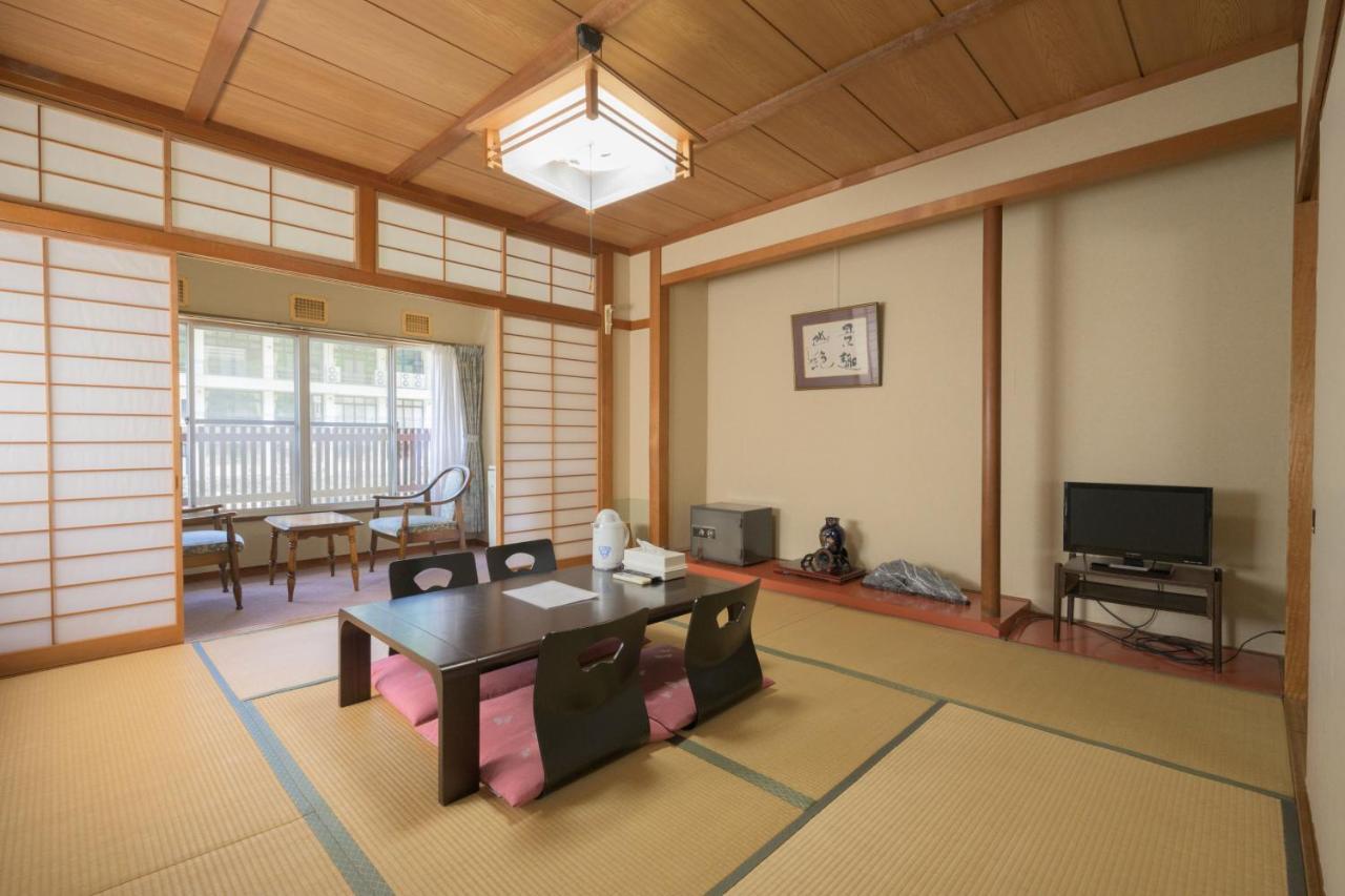 Готель Shibu Onsen Kadoya Яманоуті Екстер'єр фото
